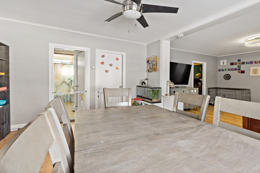 677 Oak Grove Avenue Fall River, MA 02720 - Photo 4 of 26 a view of a livingroom with furniture and a flat screen tv