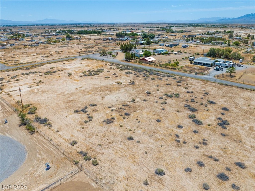 4580 Lawrence Road Pahrump, NV 89048 - Photo 26 of 40 A vast, undeveloped lot with distant mountain views awaits your vision.