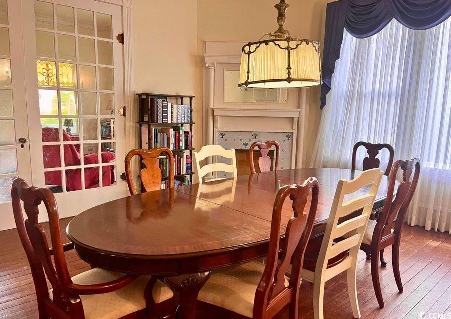 309 North Academy Street Kingstree, SC 29556 - Photo 7 of 38 Dining space with hardwood / wood-style flooring
