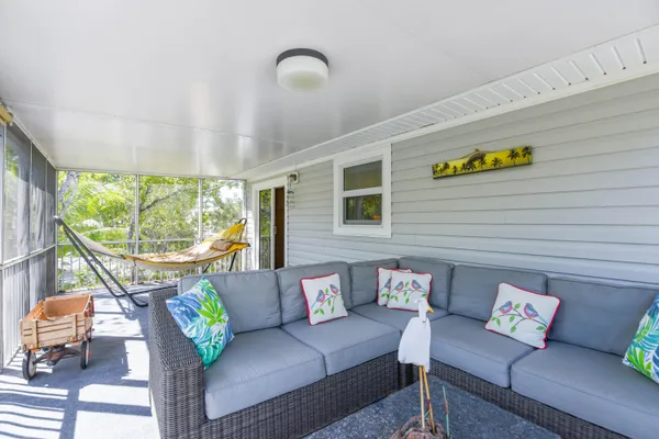 a living room with furniture and a table