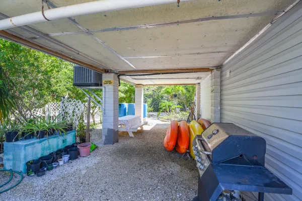 a living room filled with furniture and a table