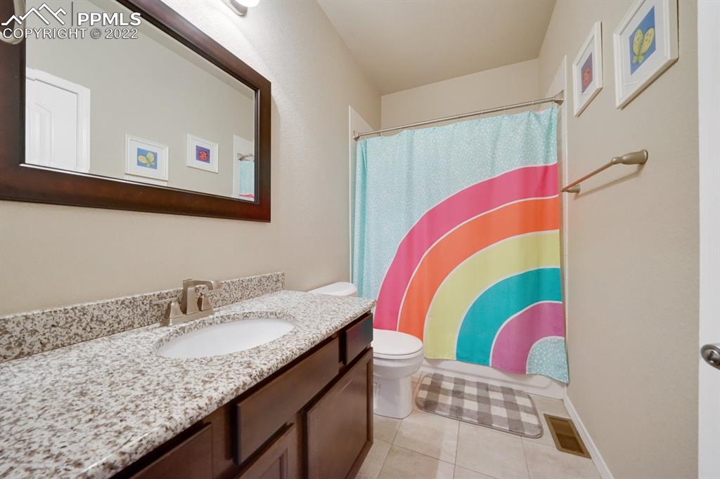 1546 York Road Colorado Springs, CO 80920 - Photo 18 of 23 a bathroom with a bathtub and a sink