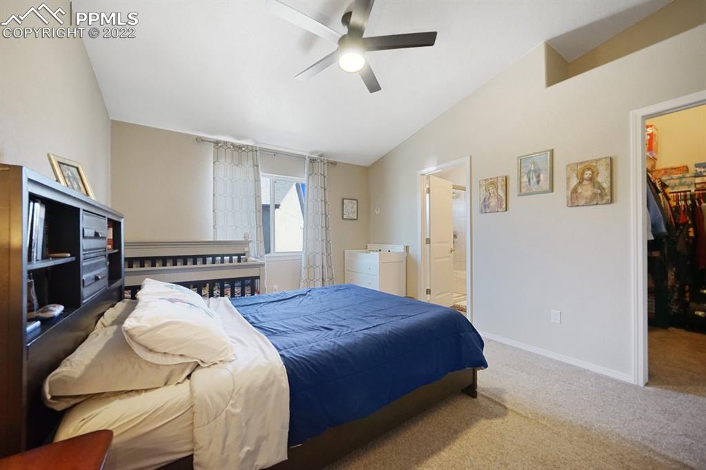 1546 York Road Colorado Springs, CO 80920 - Photo 10 of 23 a bedroom with a bed and a flat screen tv