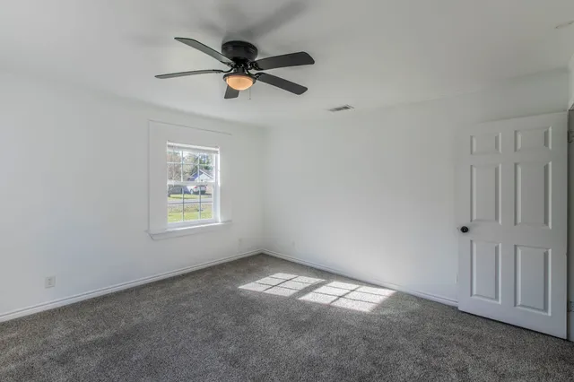 a view of empty room with window