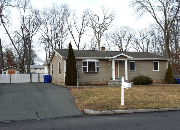 a front view of a house with yard