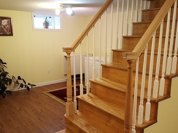 62 Corey Road Springfield, MA 01128 - Photo 12 of 26 a view of staircase with wooden floor and white walls