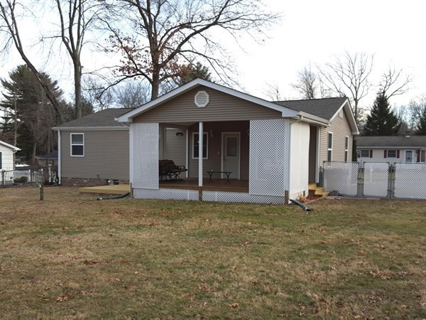 62 Corey Road Springfield, MA 01128 - Photo 25 of 26 a house with trees in the background