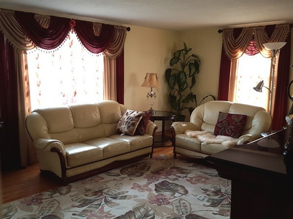 62 Corey Road Springfield, MA 01128 - Photo 4 of 26 a living room with furniture and a large window