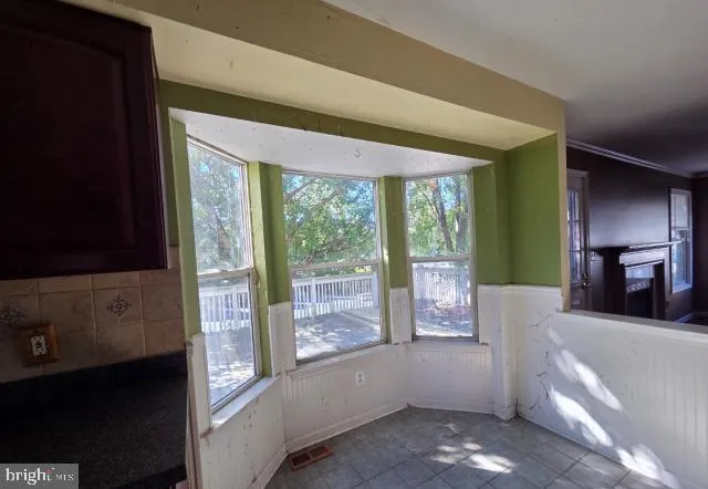 a view of a living room and window