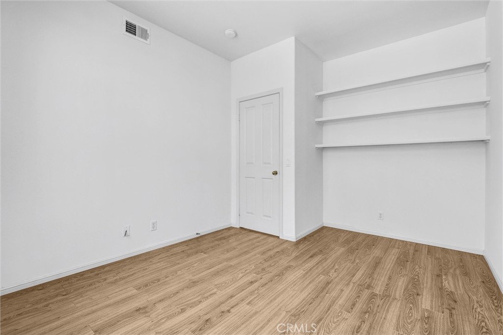 35 Del Cambrea Irvine, CA 92606 - Photo 13 of 31 a view of empty room with wooden floor