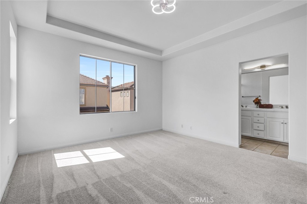 35 Del Cambrea Irvine, CA 92606 - Photo 16 of 31 a view of empty room with a fireplace and wooden floor