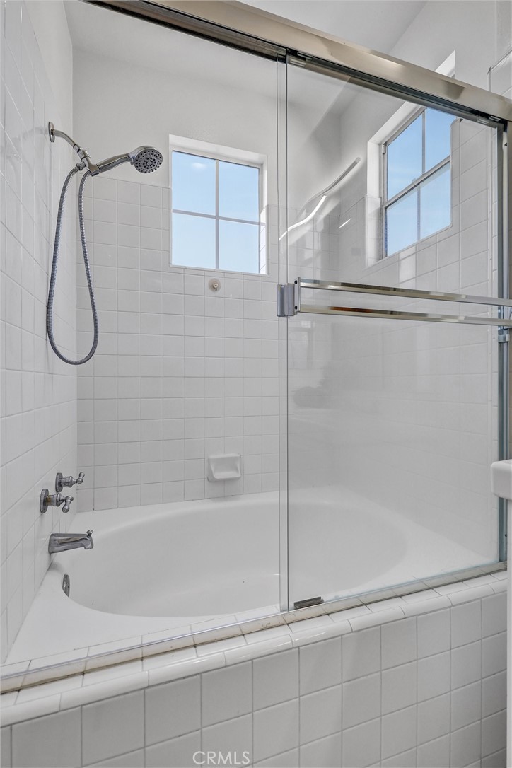35 Del Cambrea Irvine, CA 92606 - Photo 20 of 31 a bathroom with a shower and a bath tub