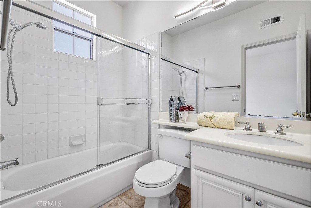 35 Del Cambrea Irvine, CA 92606 - Photo 23 of 31 a bathroom with a sink toilet and shower