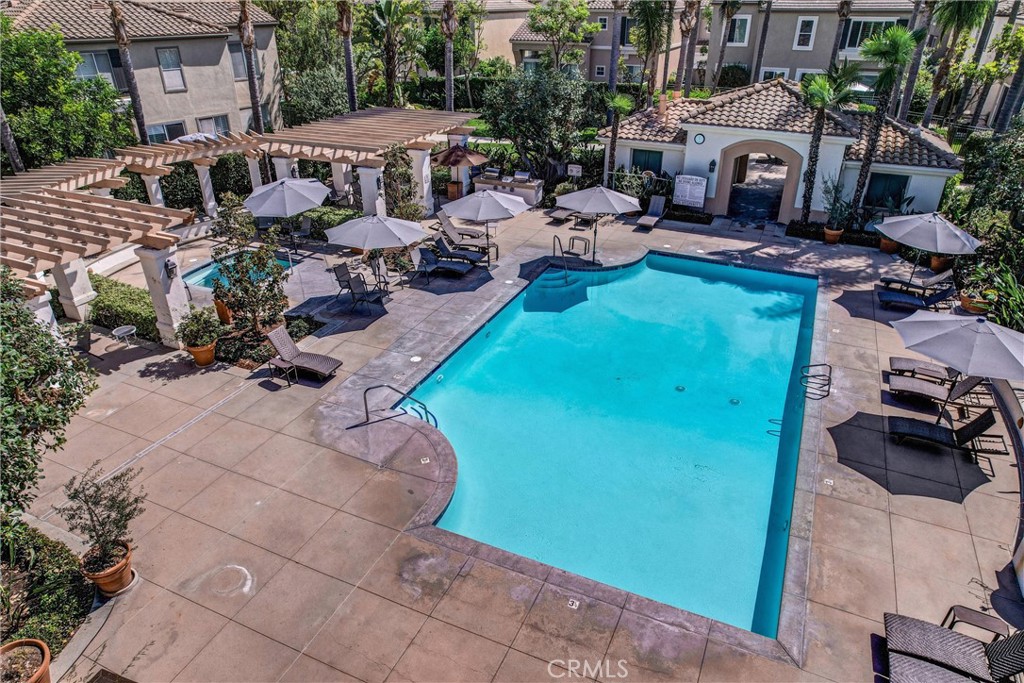 35 Del Cambrea Irvine, CA 92606 - Photo 27 of 31 a view of a house with backyard and sitting area