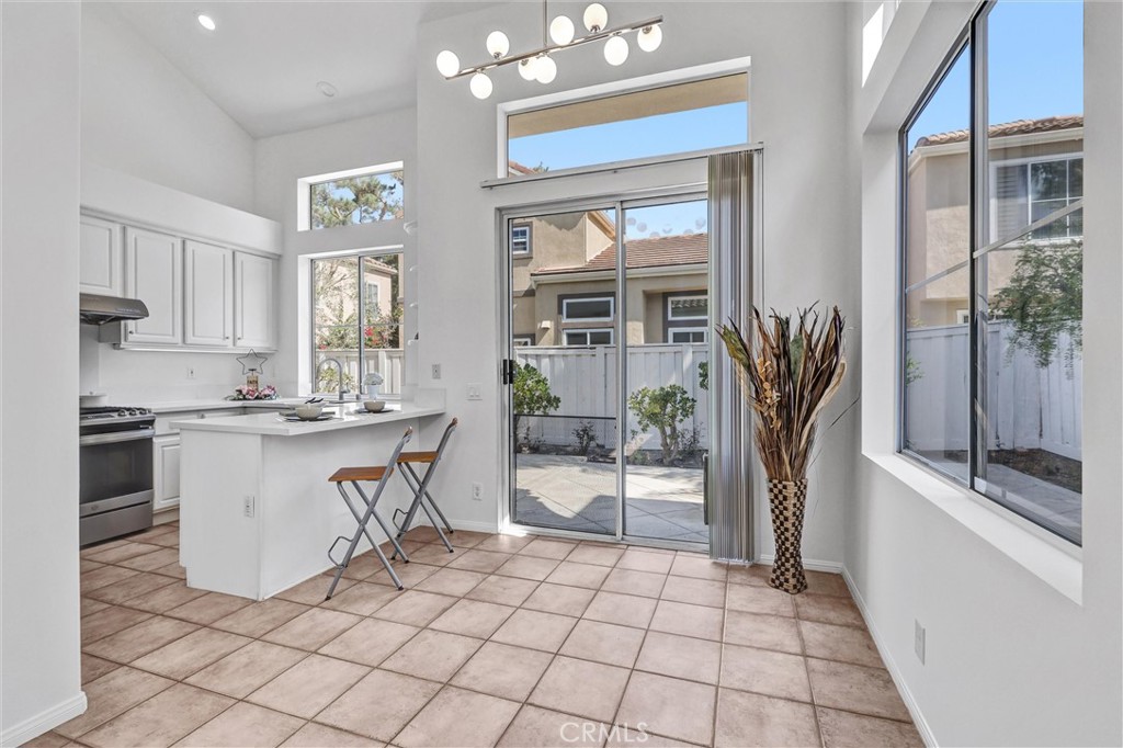 35 Del Cambrea Irvine, CA 92606 - Photo 7 of 31 a view of kitchen with sink and refrigerator