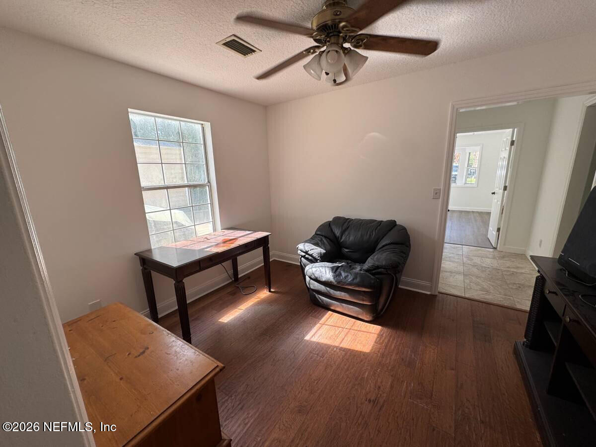 543 Ray Edwards Road St. Augustine, FL 32086 - Photo 8 of 19 a living room with furniture and a window