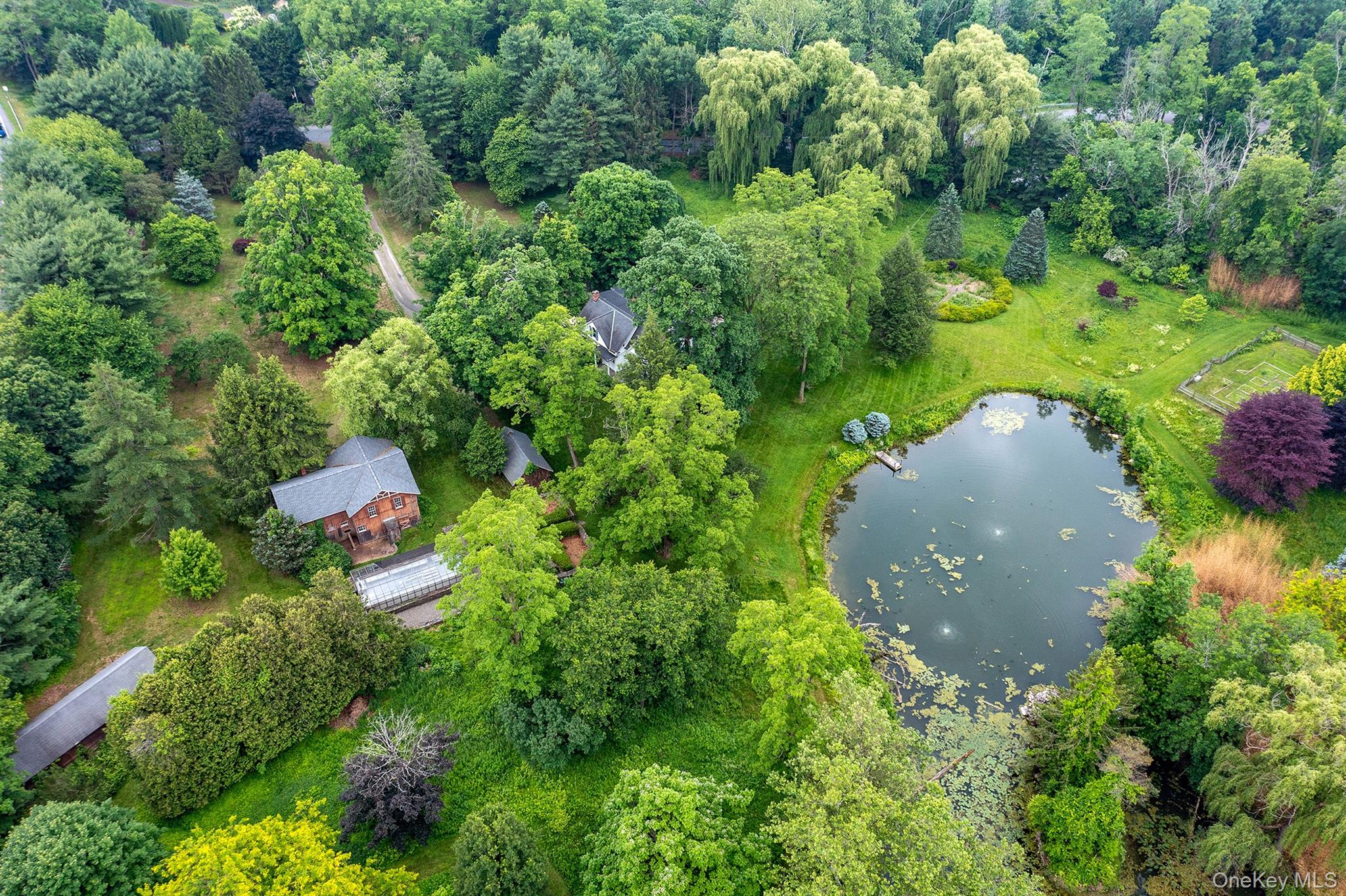 202 Buckwheat Road Hudson, NY 12534 - Photo 48 of 49 an aerial view of residential house with outdoor space and trees all around