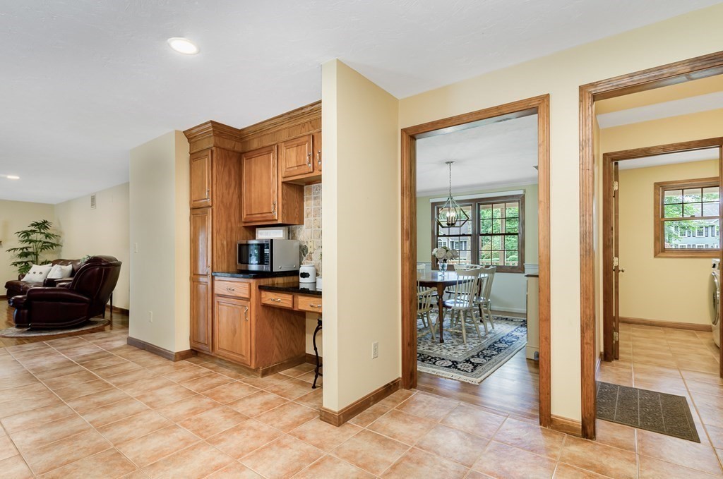 58 York Road Mansfield, MA 02048 - Photo 12 of 42 a view of kitchen with furniture and refrigerator