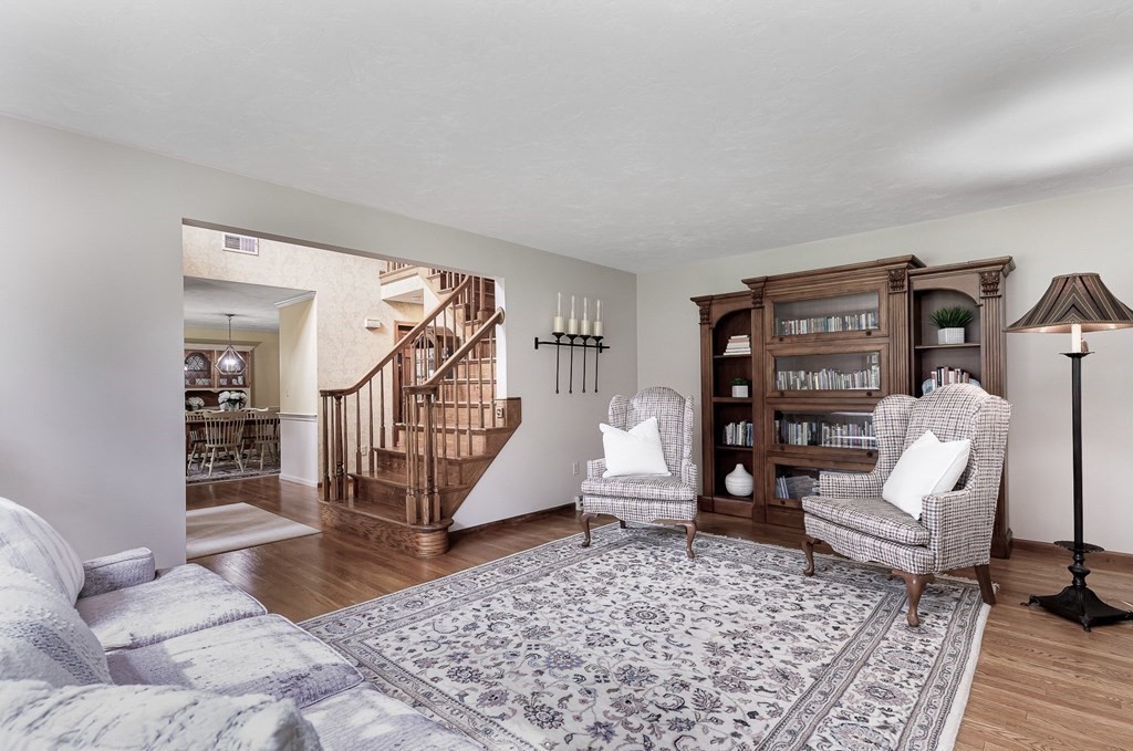 58 York Road Mansfield, MA 02048 - Photo 17 of 42 a living room with furniture and a rug