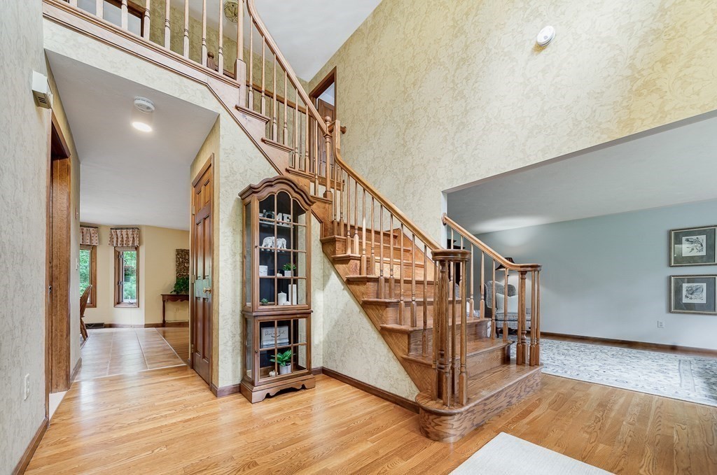 58 York Road Mansfield, MA 02048 - Photo 18 of 42 a view of entryway with wooden floor and a front door