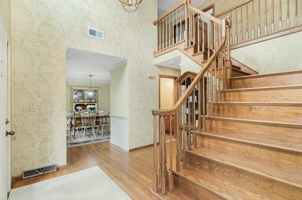 58 York Road Mansfield, MA 02048 - Photo 19 of 42 a view of entryway and hall with wooden floor