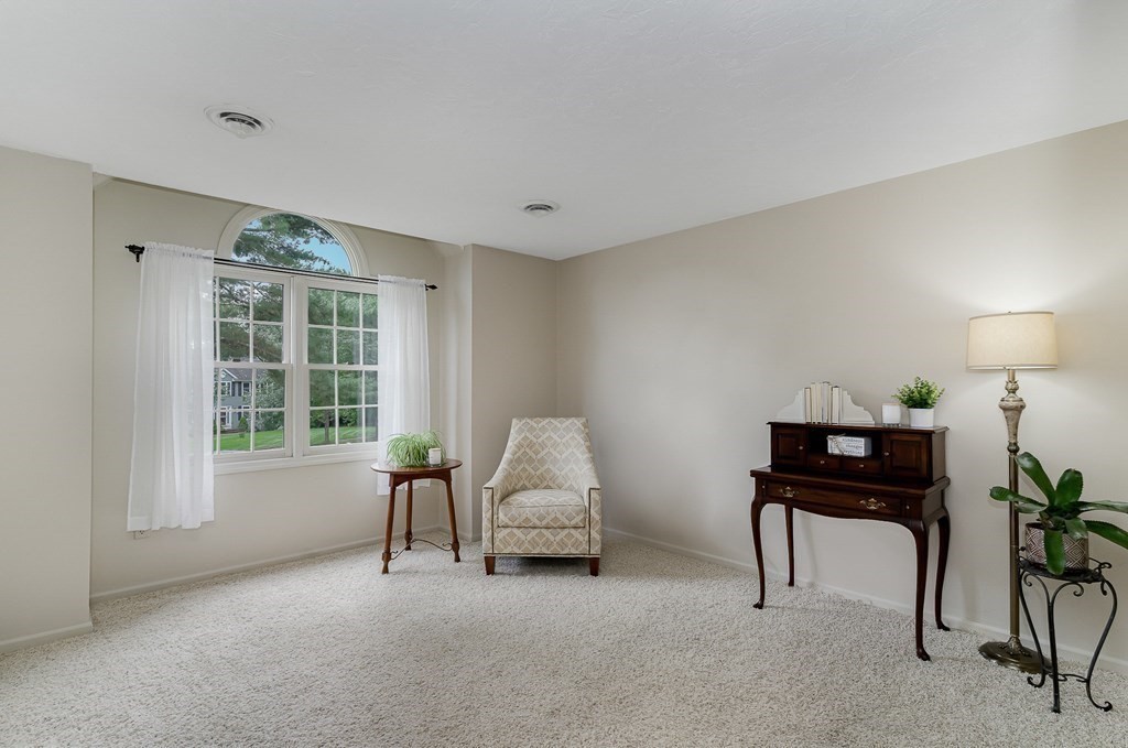 58 York Road Mansfield, MA 02048 - Photo 20 of 42 a living room with furniture and a window