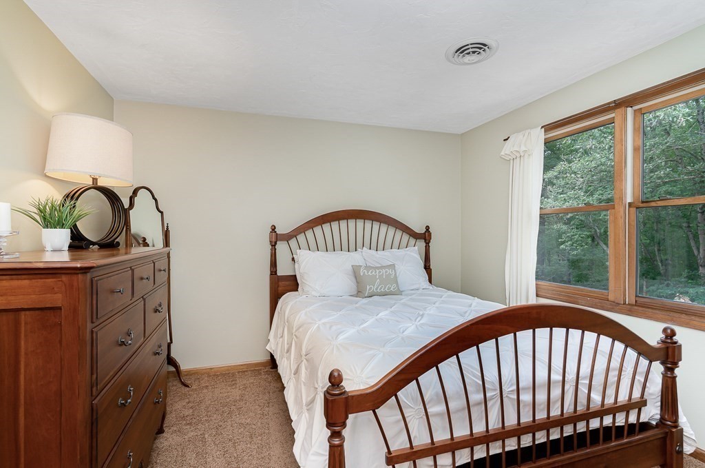 58 York Road Mansfield, MA 02048 - Photo 22 of 42 a bedroom with a bed and a window