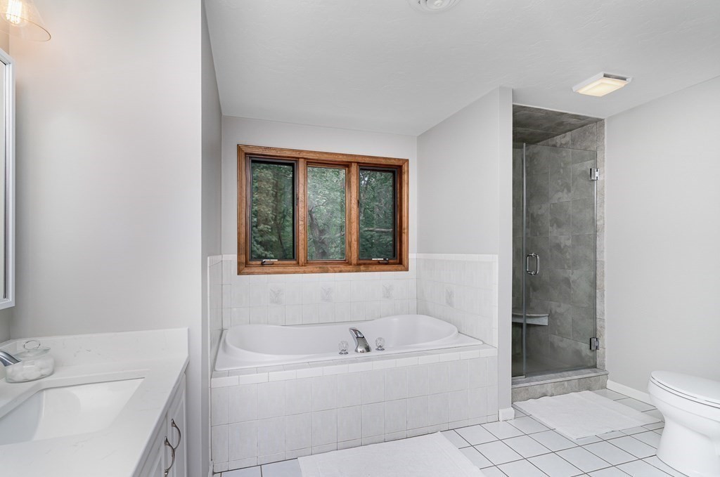 58 York Road Mansfield, MA 02048 - Photo 29 of 42 a bathroom with a bathtub toilet and sink