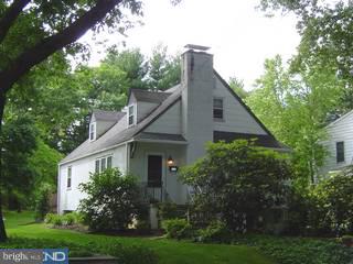228 Sunnybrook Road Flourtown, PA 19031 - Photo 1 of 6 a front view of house with a garden
