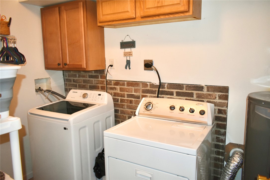 608 McKinney Way Westminster, SC 29693 - Photo 20 of 34 Laundry with storage cabinets.