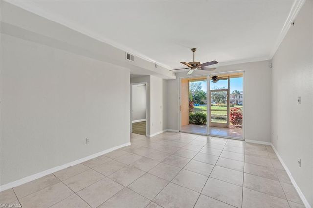 a bedroom with a bed window and wall painting