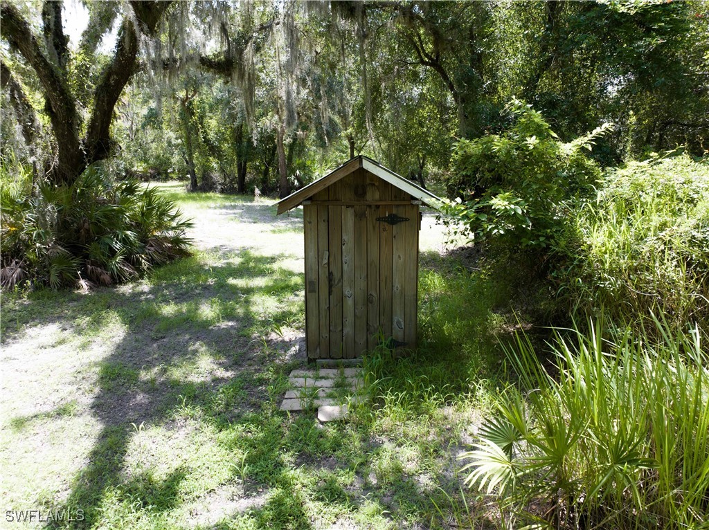 1269 Northwest Peace Pointe Drive Arcadia, FL 34266 - Photo 19 of 21 a fire hydrant in the middle of a forest