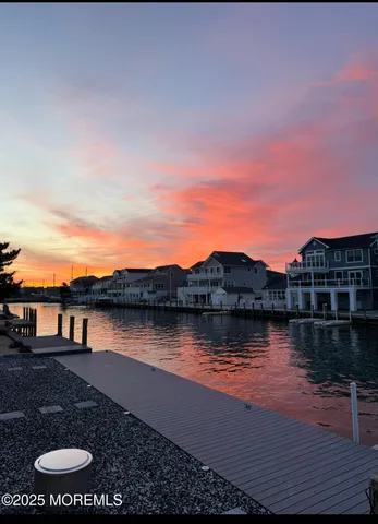 a view of a lake with a yard