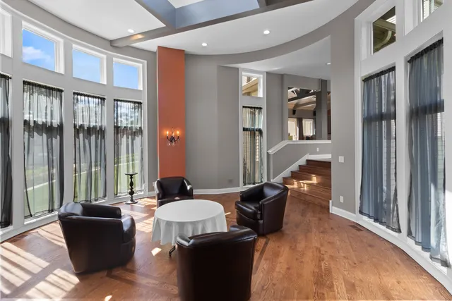 a bedroom with a bed and a fireplace