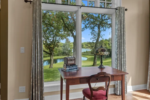 a spacious bathroom with a sink a large mirror and a bathtub