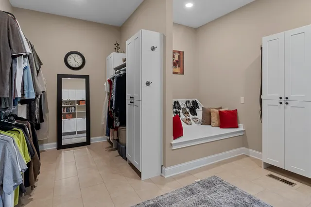 a utility room with sink dryer and washer
