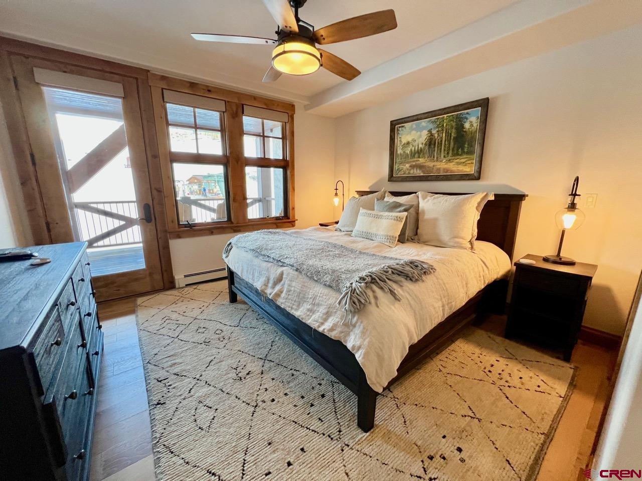 14 Hunter Hill Road, Unit C203 Crested Butte, CO 81225 - Photo 14 of 34 a bedroom with a bed and a window