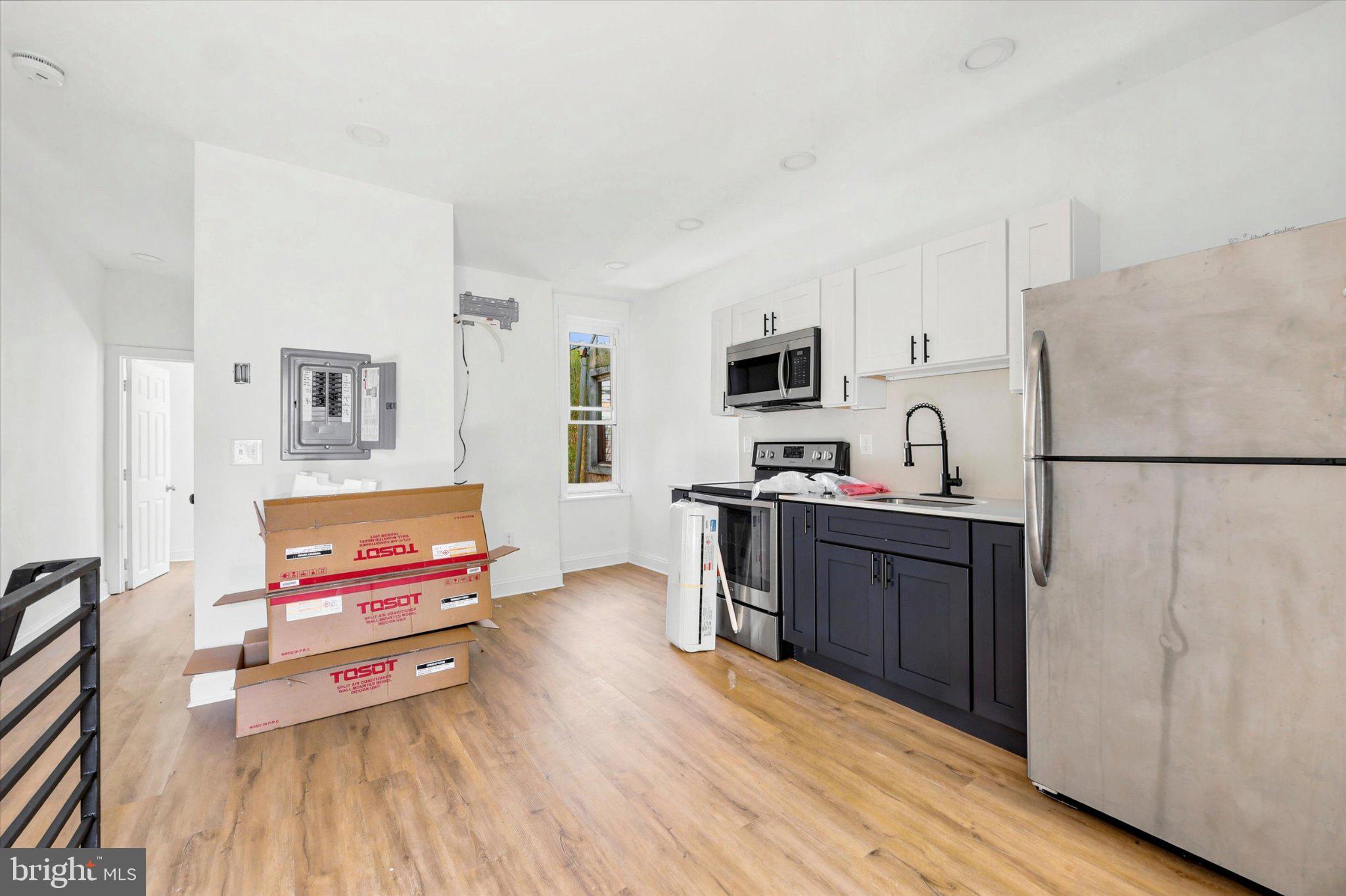 2046 South Norwood Street, Unit 2 Philadelphia, PA 19145 - Photo 9 of 17 Modern kitchen with sleek finishes.