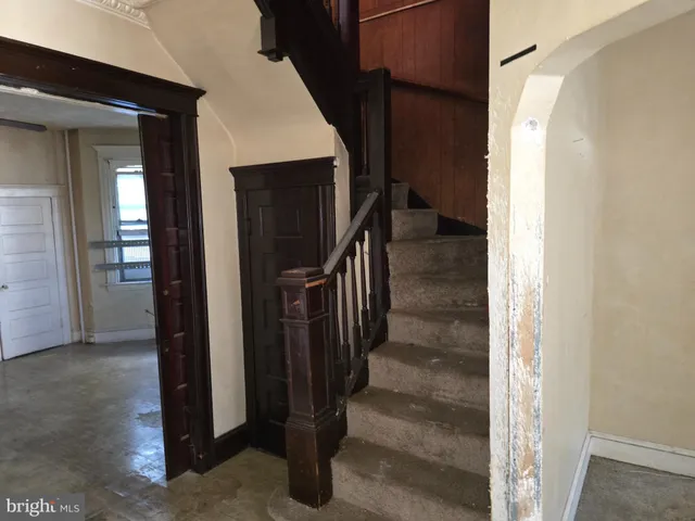 a view of entryway with stairs