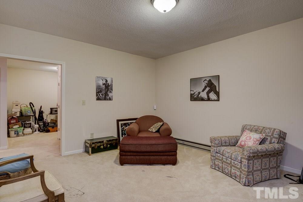 102 Timber Ridge Drive Durham, NC 27713 - Photo 20 of 25 Bonus Room with the Den in the background.