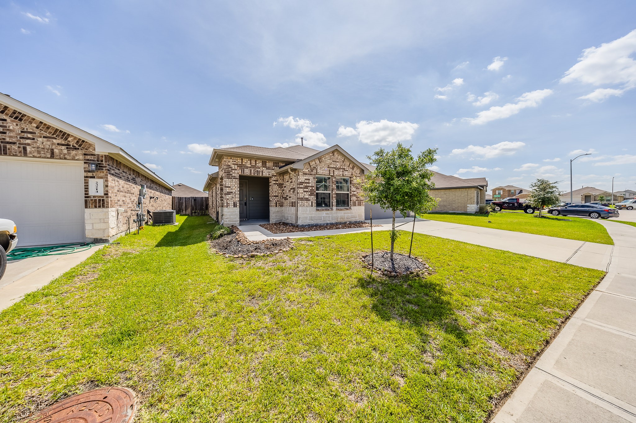 23210 Barberry Crk Trail Spring, TX 77373 - Photo 27 of 33 a swimming pool with outdoor seating and yard