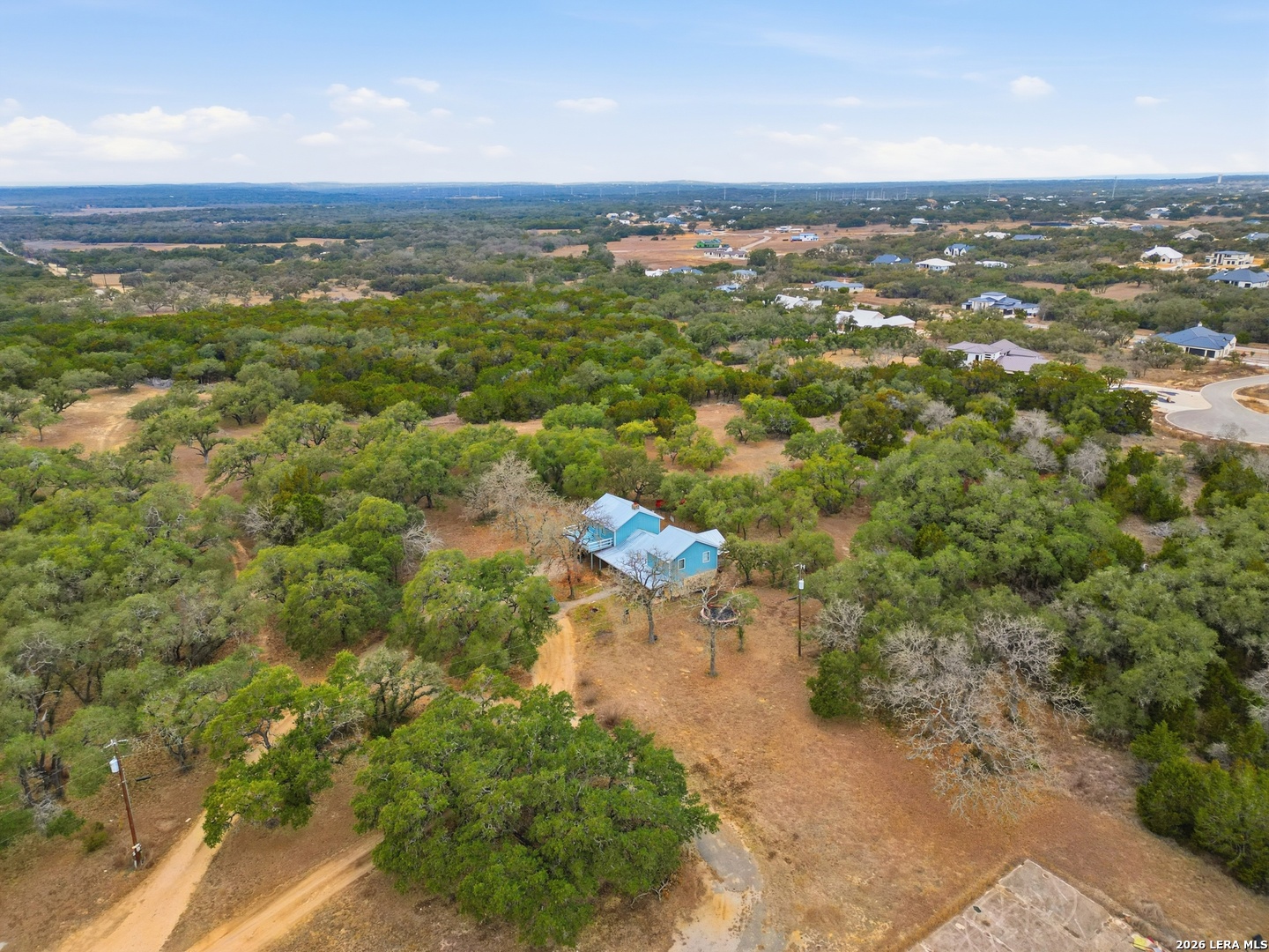 31910 Blanco Road Bulverde, TX 78163 - Photo 17 of 25 a view of a city with mountains in background