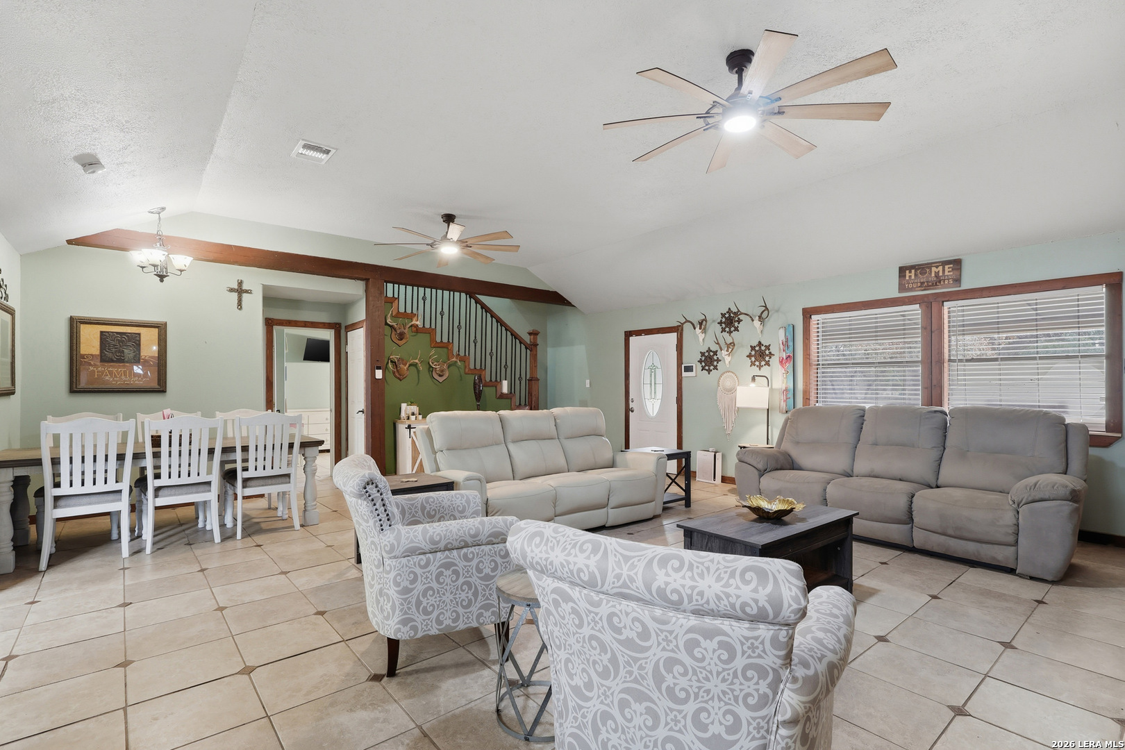 31910 Blanco Road Bulverde, TX 78163 - Photo 4 of 25 a living room with furniture and a large window