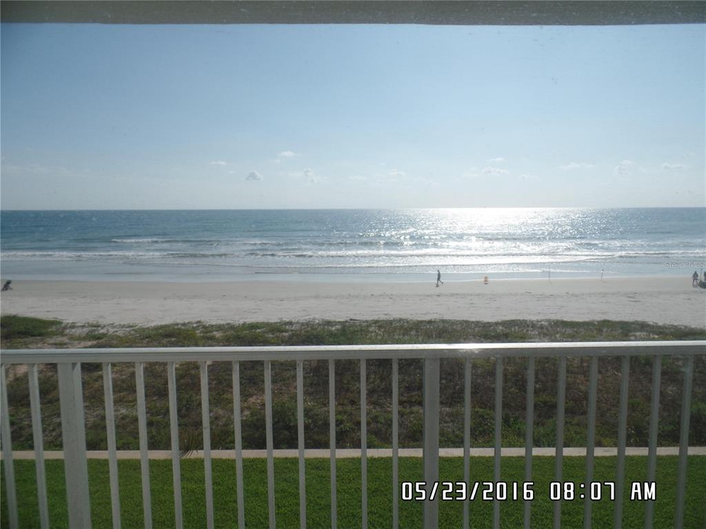 815 Ocean Shore Boulevard, Unit 13A Ormond Beach, FL 32176 - Photo 1 of 11 a view of a building with an outdoor space