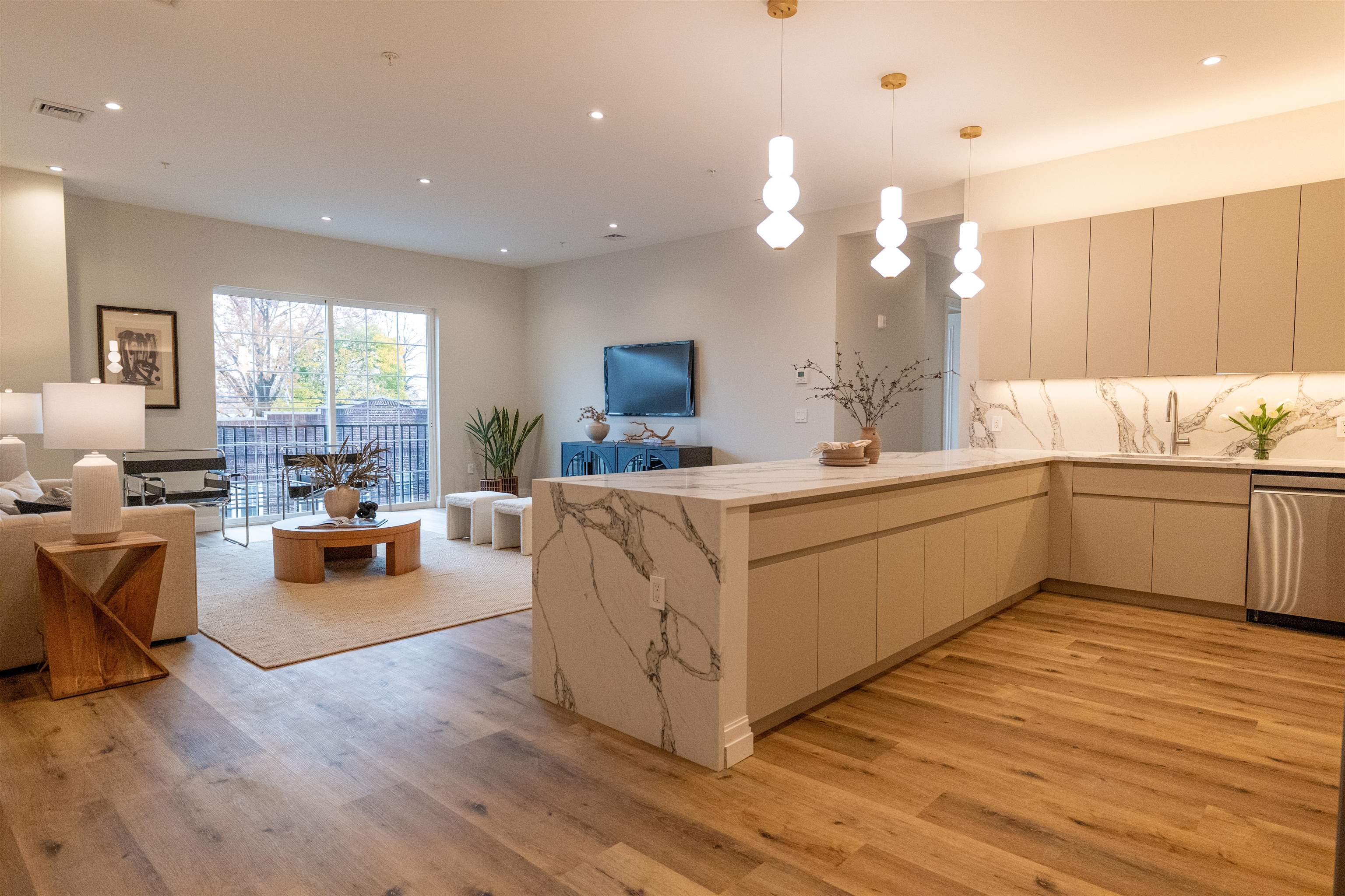 1722 Springfield Avenue, Unit 403 Maplewood, NJ 07040 - Photo 1 of 31 a kitchen with a sink cabinets and wooden floor