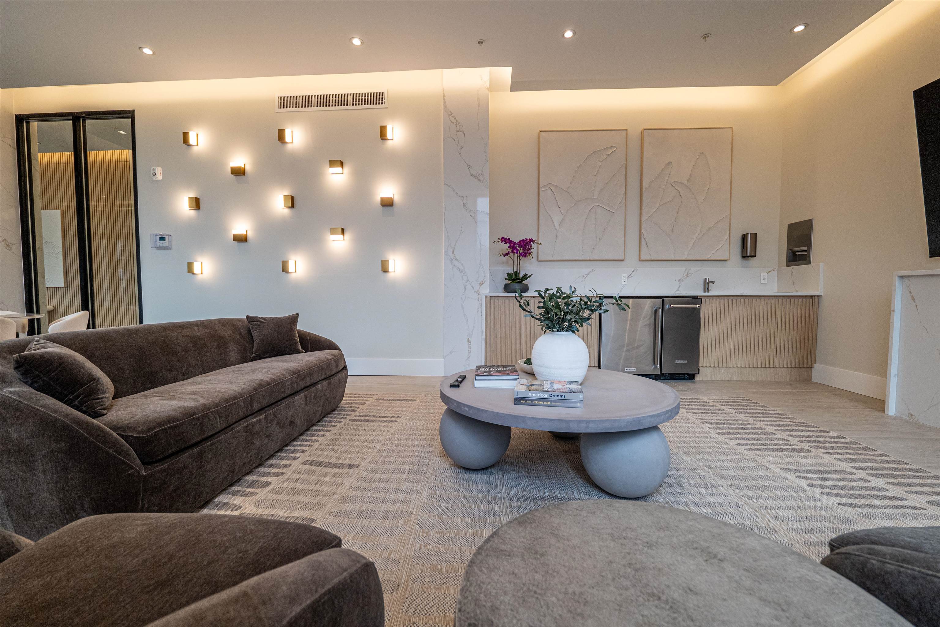 1722 Springfield Avenue, Unit 403 Maplewood, NJ 07040 - Photo 27 of 31 a living room with furniture and a dining table with kitchen view