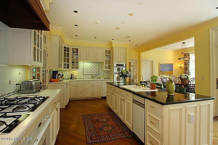 25 Ridgeway Greenwich, CT 06831 - Photo 15 of 25 a kitchen with sink stove and cabinets