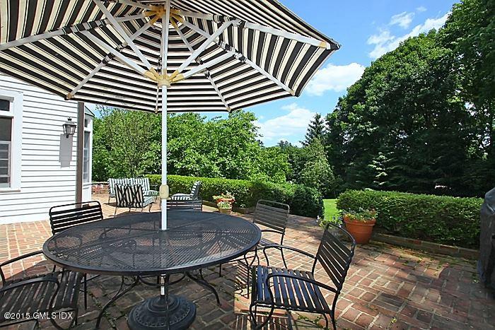25 Ridgeway Greenwich, CT 06831 - Photo 18 of 25 a backyard view with a seating space