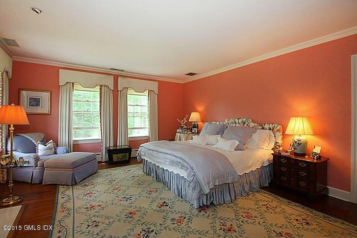 25 Ridgeway Greenwich, CT 06831 - Photo 21 of 25 a bedroom with a bed and a couch