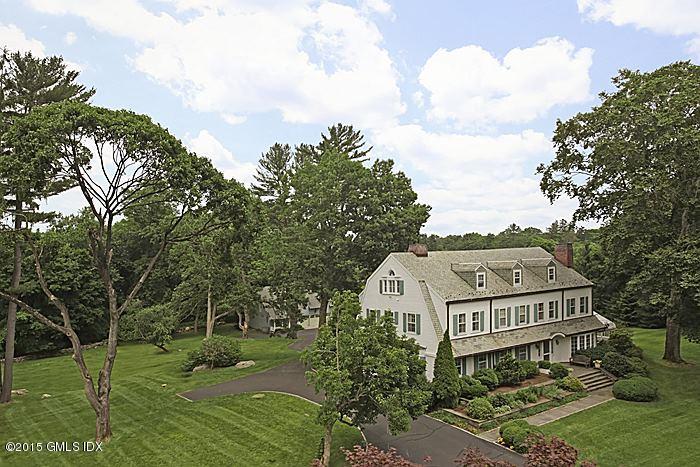 25 Ridgeway Greenwich, CT 06831 - Photo 4 of 25 aerial view of a house with a yard and potted plants